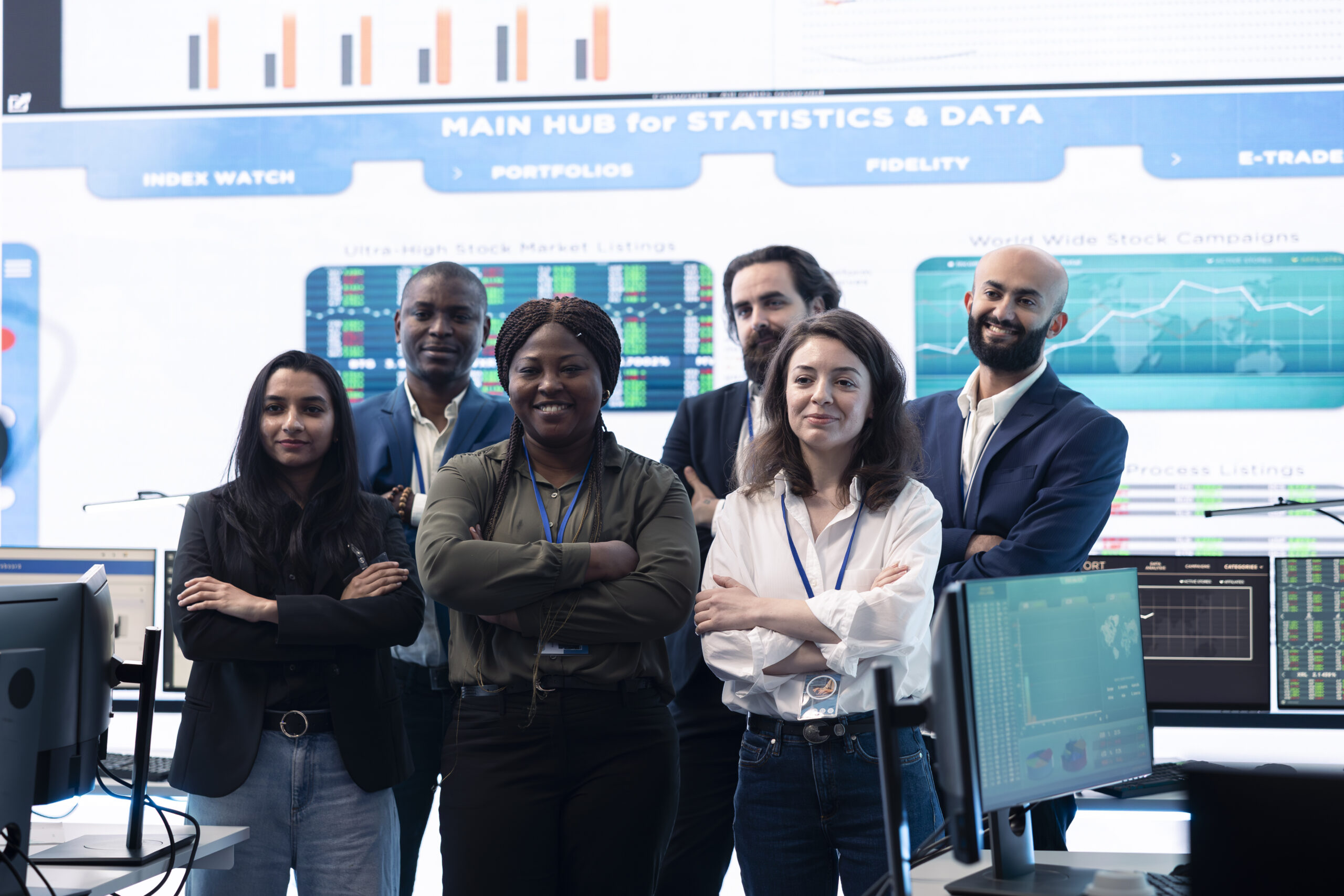 Confident smiling enterprise team uniting their forces to improve workflow